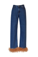 Rayane Bacha Astra Feather denim jeans shown in a front view highlighting the stylish blue denim fabric and feather detailing.