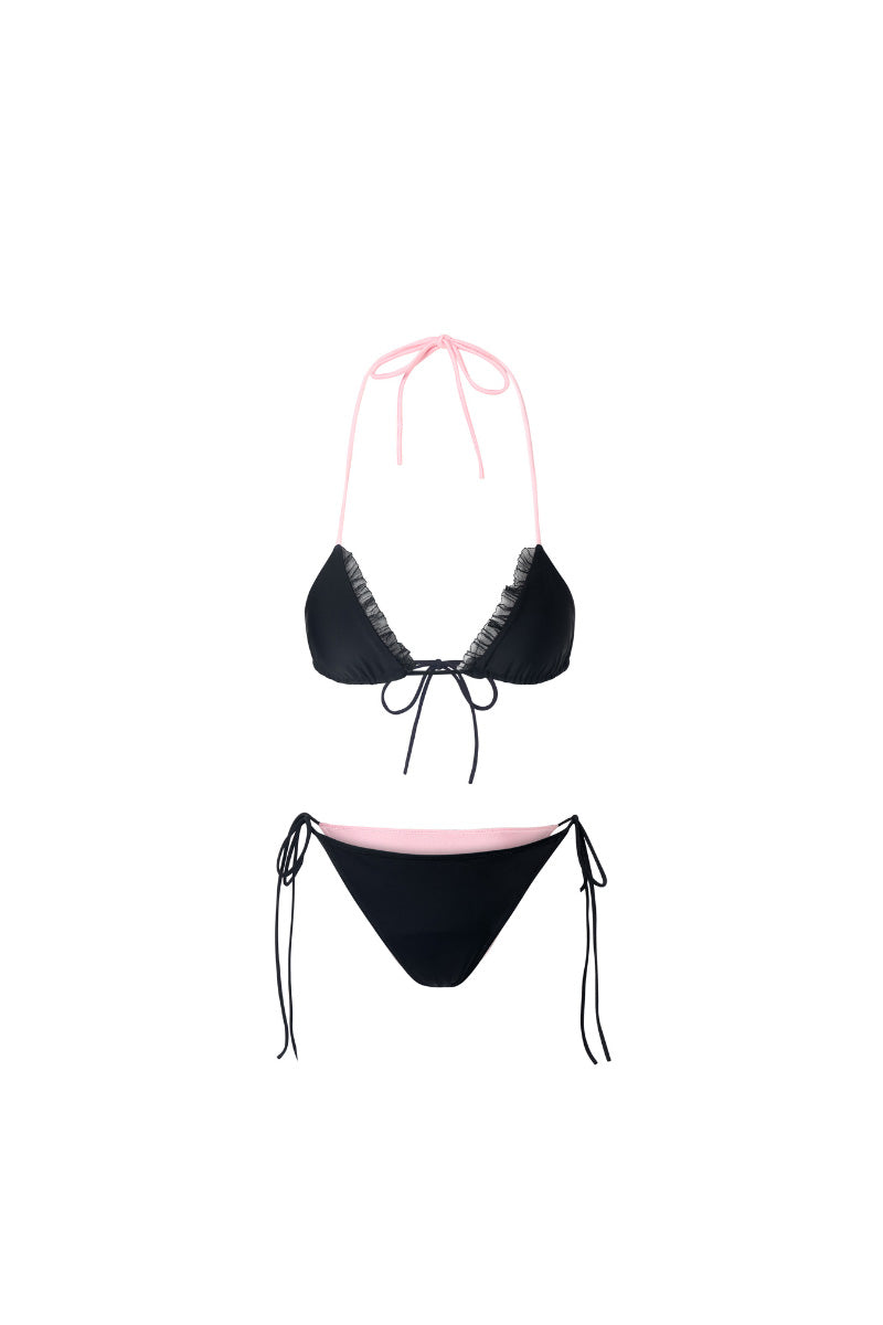 Reversible pink and black bikini set by Suncillo, featuring halter top and matching bottoms on a flat lay.