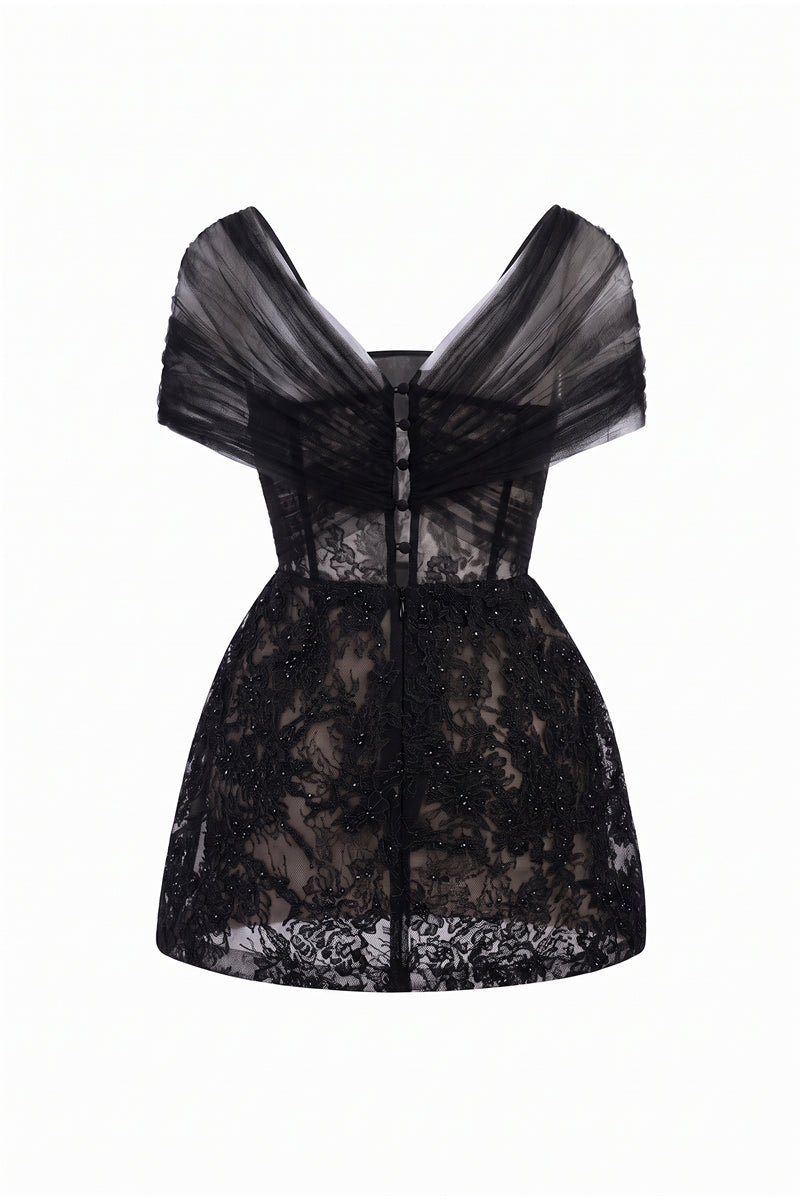 Black Bianca lace mini dress by 21Six, featuring delicate lace fabric and a fitted silhouette, shown on a model.
