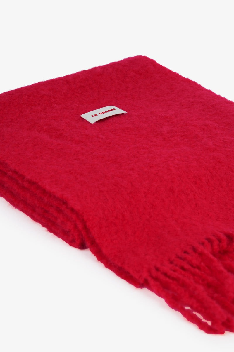Red oversized scarf from La Granni, soft and cozy scarf with a flowing, draped design perfect for stylish layering.