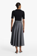 Long flowing maxi skirt by Acaria Studio with a soft, elegant design and subtle pattern, perfect for stylish casual wear.