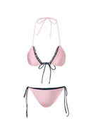 Reversible pink and black bikini set by Suncillo with triangle top and matching bottom, displayed on a white background.