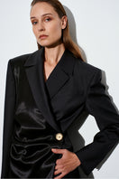 Black Berry Blazer Dress by Acaria Studio, a stylish mini dress with a tailored blazer-inspired design, shown on a model.