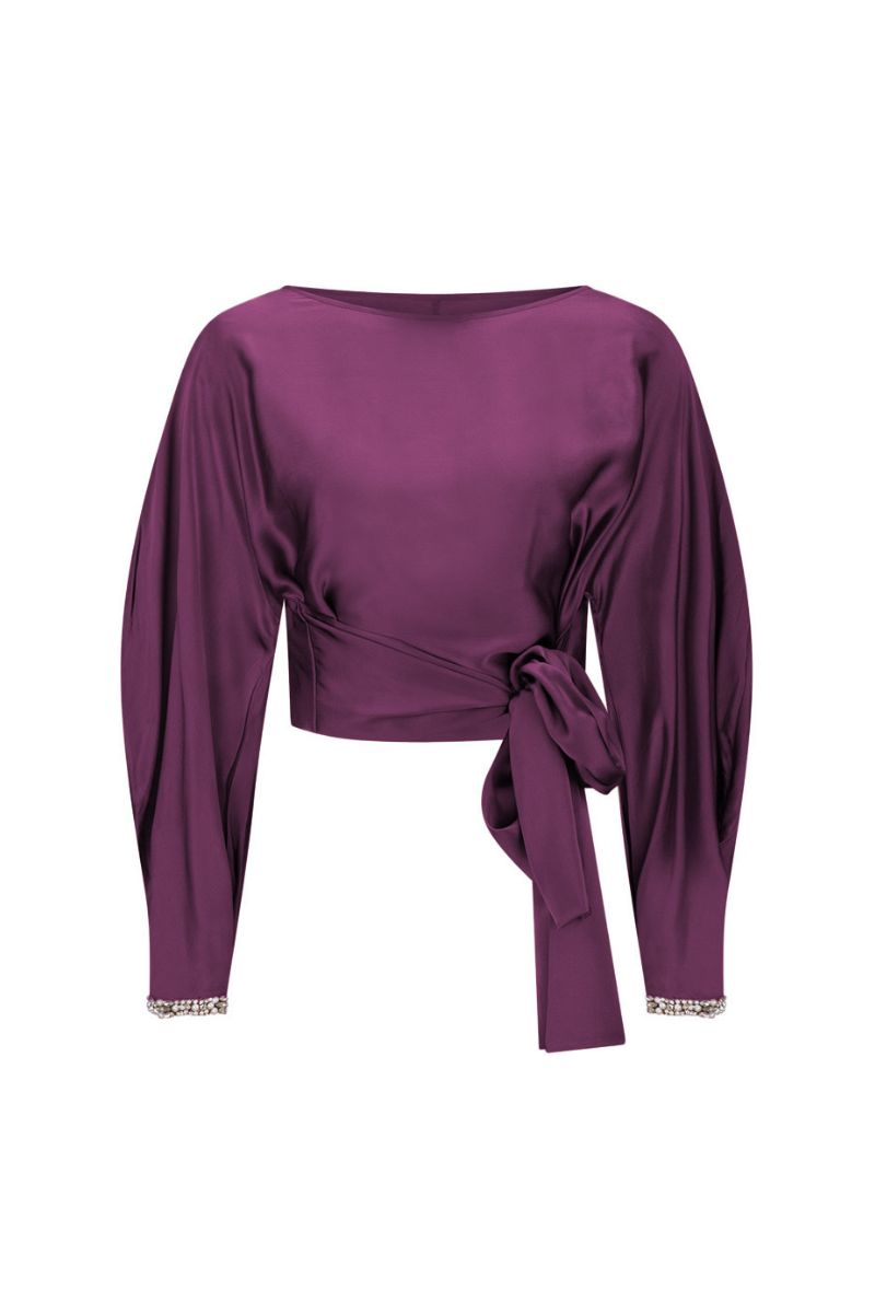 Beaded cuff top in aubergine from Mastani featuring beaded details on the cuffs and a stylish, fitted design.