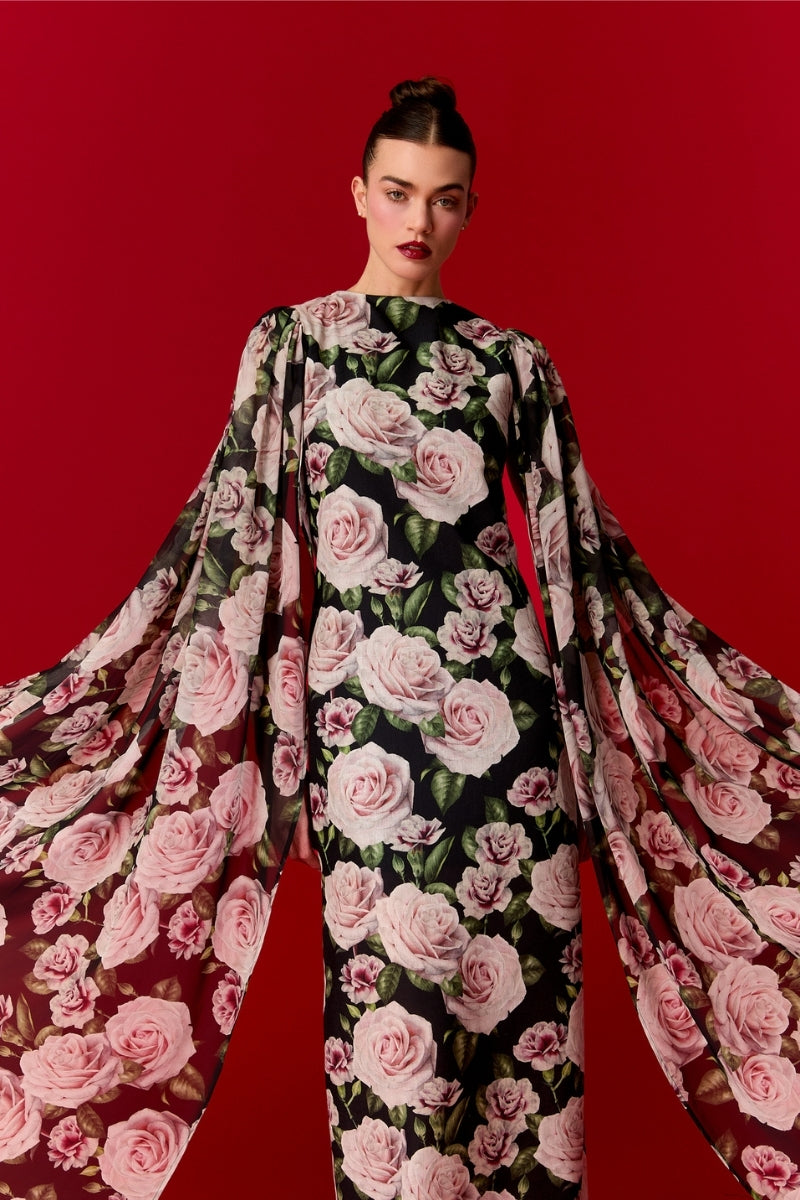 Nur Karaata Marianne maxi dress, long flowing dress with floral patterns, sleeveless design, and elegant silhouette.