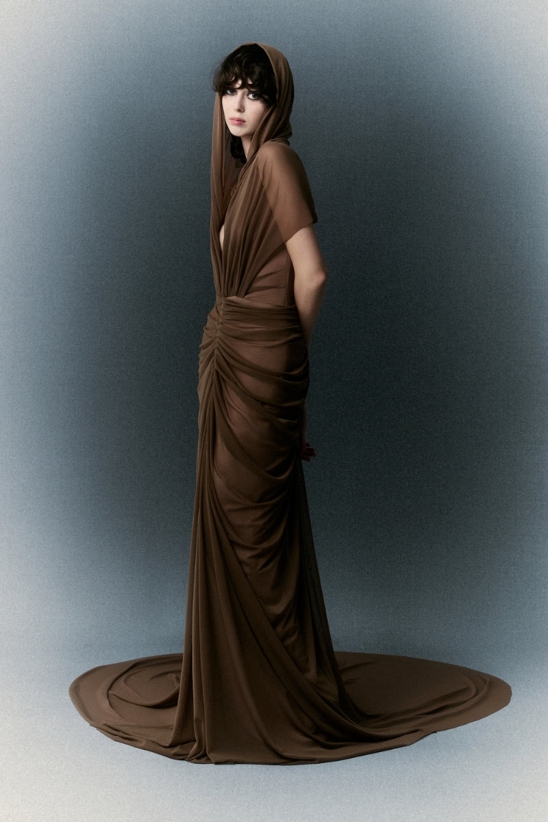 White Plan Margaret gown, elegant long dress with flowing fabric and subtle design details, suitable for formal occasions.