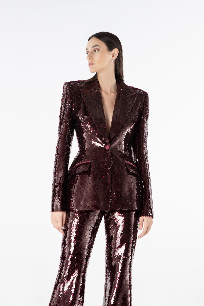 Lili Blanc sequin trousers with shiny, embellished fabric and tailored fit, shown from the front on a white background.