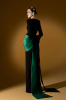 Green Loreli crepe and taffeta gown by I.H.F, showcasing elegant fabric and flowing design on a mannequin.