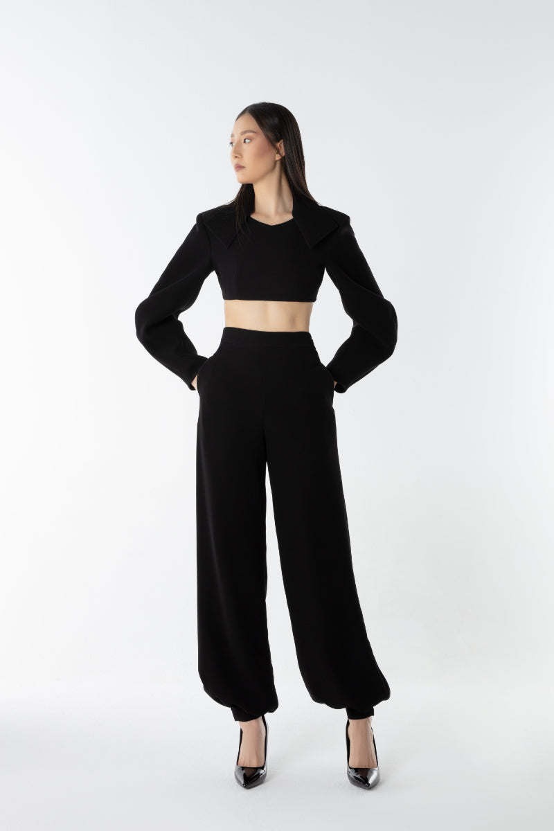 Lili Blanc Crystal Volume Trousers, stylish women's pants with a textured fabric and relaxed fit, shown on a model.