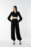 Lili Blanc Crystal Volume Trousers, stylish women's pants with a textured fabric and relaxed fit, shown on a model.