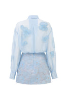 FELICIA blue shiny silk floral co-ord set featuring a matching shirt and skirt from 21Six, with vibrant floral patterns and glossy finish.