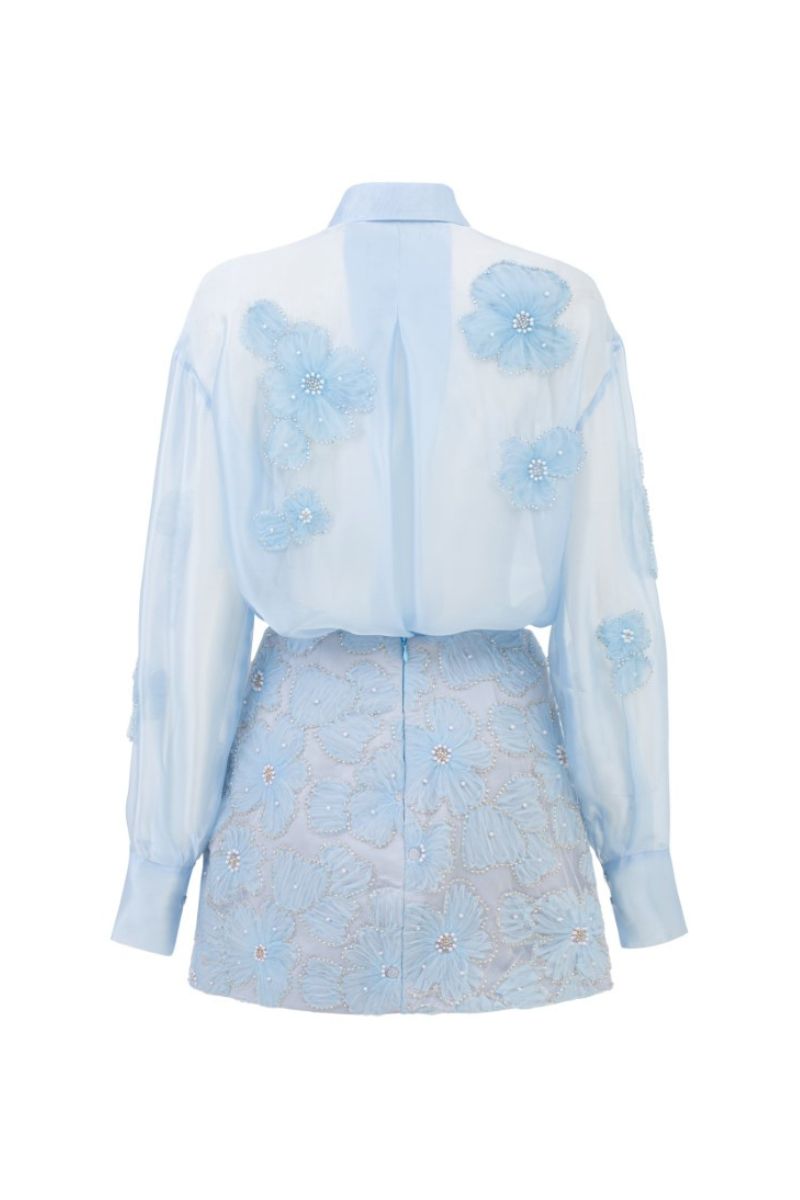 FELICIA blue shiny silk floral co-ord set featuring a matching shirt and skirt from 21Six, with vibrant floral patterns and glossy finish.