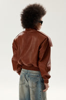 LARETAGGIO TIVOLI II leather bomber jacket in camel, featuring a stylish zip-up design and ribbed cuffs.