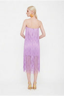 Valenciani lilac all-over fringe midi dress featuring flowing fabric and a stylish, bohemian-inspired design.