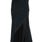 Sean Sheila deconstructed black maxi skirt with asymmetrical design and flowing fabric, styled for a modern, chic look.