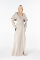 Lili Blanc cashmere wrap maxi skirt in a soft, elegant fabric with a flowing design and subtle wrap detail.