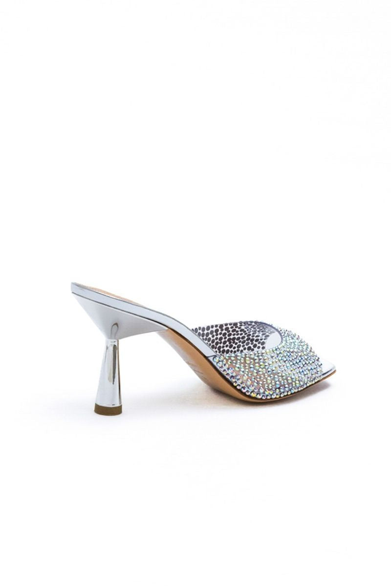 Kolane Greta mule sandals in silver crystal transparent design, featuring clear straps and a sleek flat sole.