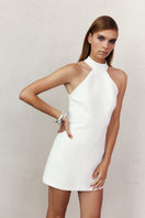 White Nazlı Ceren Marcel Mini Crepe Dress displayed on a hanger, showcasing its sleek mini dress design and smooth crepe fabric.
