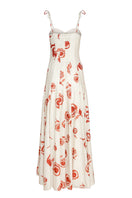 Estefania Rosetta Maxi Dress featuring a flowing fabric, V-neckline, and elegant ankle-length design in a vibrant pattern.