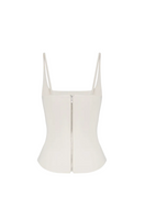 Beige matte silk corset top with straps by BALYKINA, featuring a fitted design and smooth, luxurious fabric.