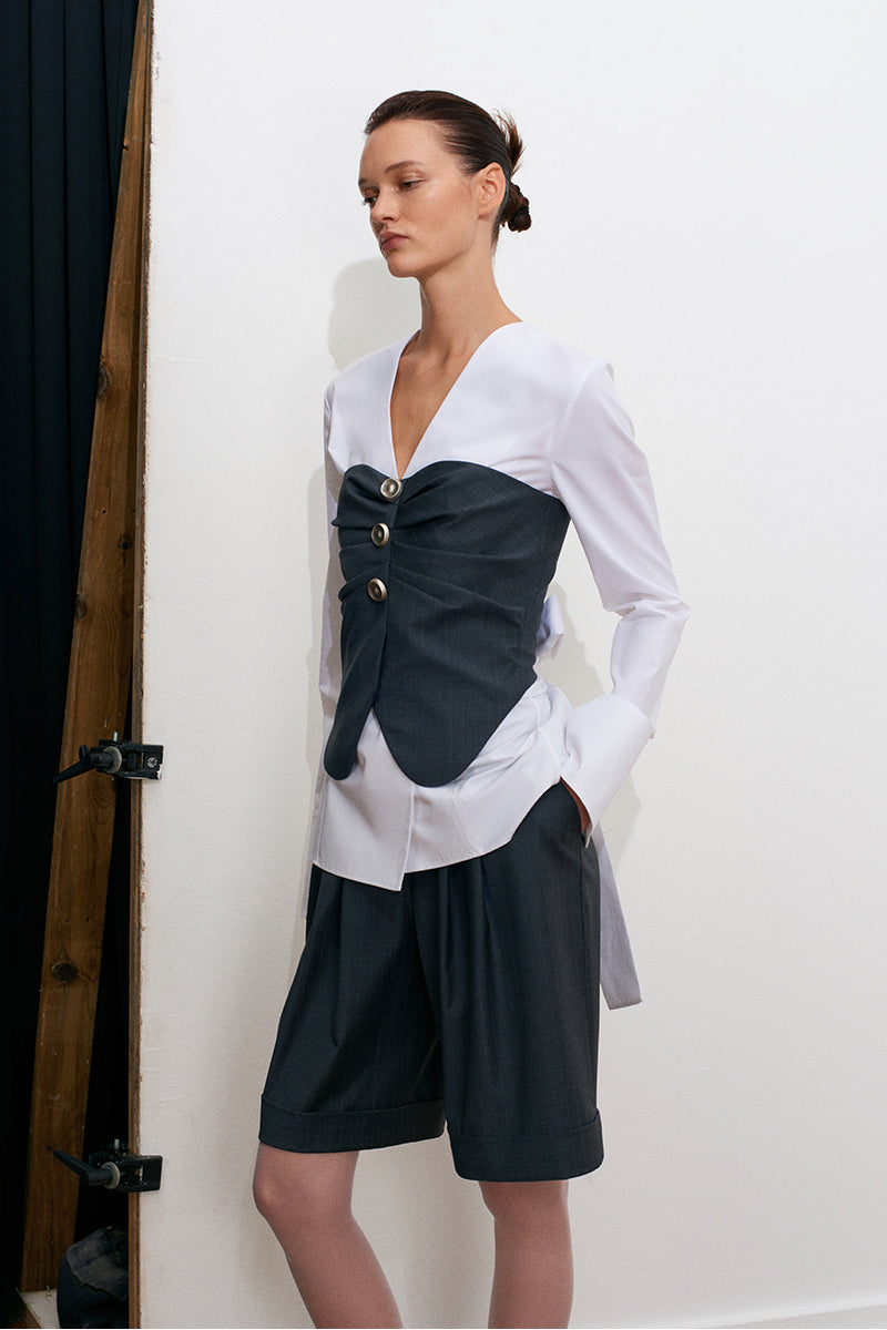 Gray striped Acaria Studio GURU top with long sleeves and relaxed fit, featuring a stylish, comfortable design.