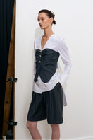 Gray striped Acaria Studio GURU top with long sleeves and relaxed fit, featuring a stylish, comfortable design.