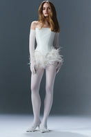 White feathered underwear pants from BALYKINA, featuring soft fabric and delicate feather detailing.