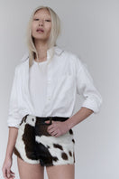 ZUT Ellis leather shorts with a fitted design, featuring a sleek black finish and stylish waistband, perfect for casual or trendy looks.