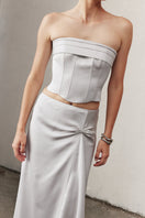 Nazlı Ceren Corinne satin maxi skirt in silver lining, featuring a flowing design and elegant fabric for sophisticated style.