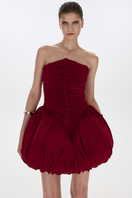 BalYKINA Clara Burgundy Mini Dress displayed on a model, showcasing the elegant, fitted design and rich burgundy color.