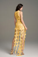 Yellow floral lace maxi dress by I.H.F Studio featuring intricate lace details and a flowing silhouette.