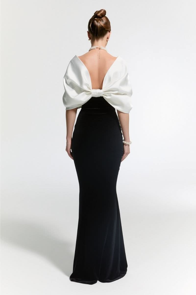 Nur Karaata CULT MIA X NUR KARAATA Buckingham gown, elegant long gown with intricate details, worn by model in a stylish pose.