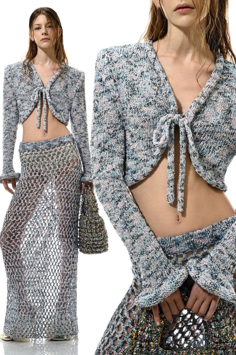 Lalo Sirena blue cardigan with a relaxed fit, featuring long sleeves and a soft knit fabric, displayed on a hanger.