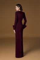 Red crepe silk lined gown by I.H.F, featuring elegant draping and long sleeves, perfect for formal occasions.