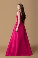 Pink taffeta silk lined maxi gown by I.H.F with elegant flowing design and detailed fabric texture.