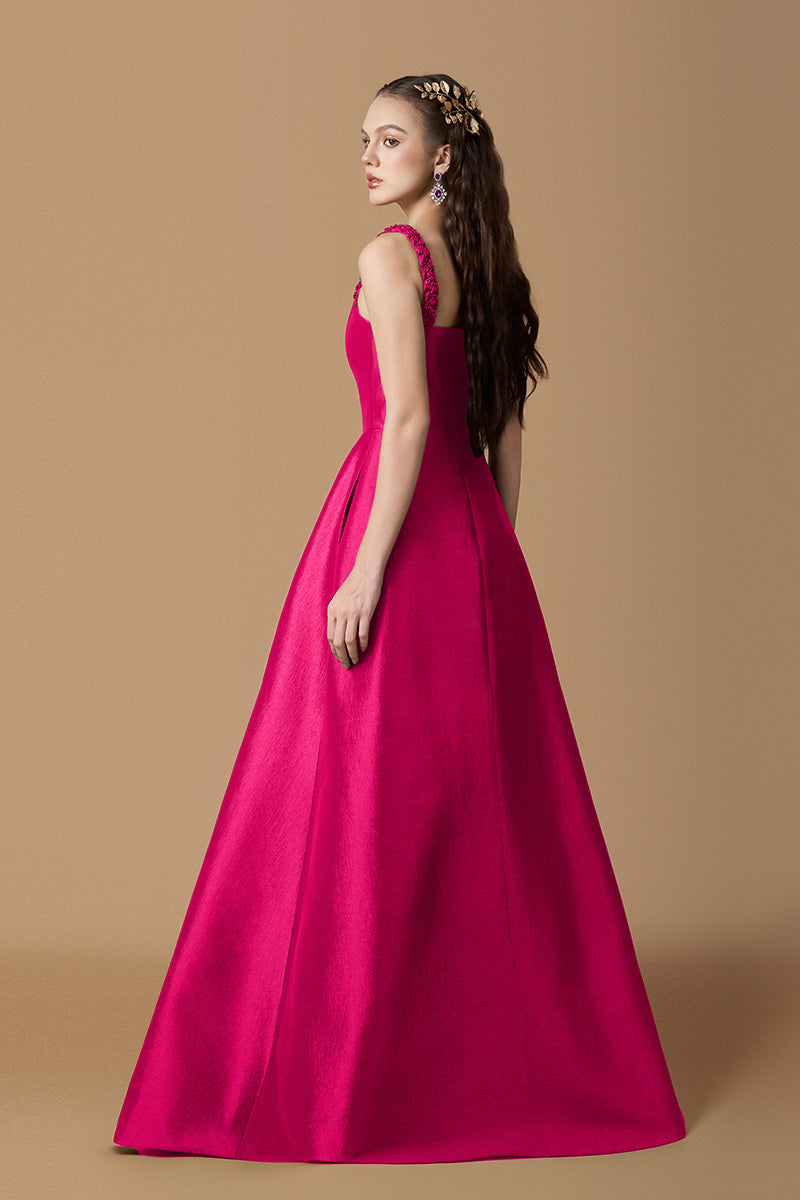 Pink taffeta silk lined maxi gown by I.H.F with elegant flowing design and detailed fabric texture.