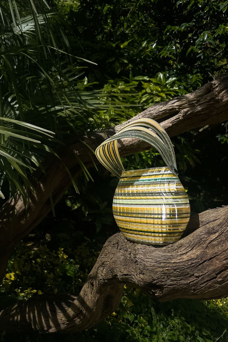 Touchless Cult Mia X clutch handbag with green and yellow gem blend design, featuring a sleek, modern touchless style.