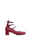 Dark red Je La Connais Rouge heels with sleek design and pointed toe, shown on a neutral background.