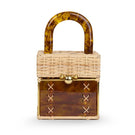 Waiwai Rio Cacau Turtle Top Handle Bag with rounded top handle and textured leather in a stylish, compact design.