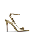 Gold heels from 10th Floor MIDNIGHTS HEEL collection, featuring a stylish design and elegant heel shape.
