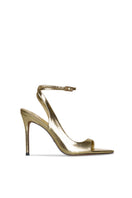 Gold heels from 10th Floor MIDNIGHTS HEEL collection, featuring a stylish design and elegant heel shape.