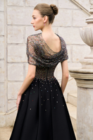 Elegant Tracy Studio crystal lace and bamboo taffeta gown with intricate lace details and flowing fabric, perfect for formal occasions.