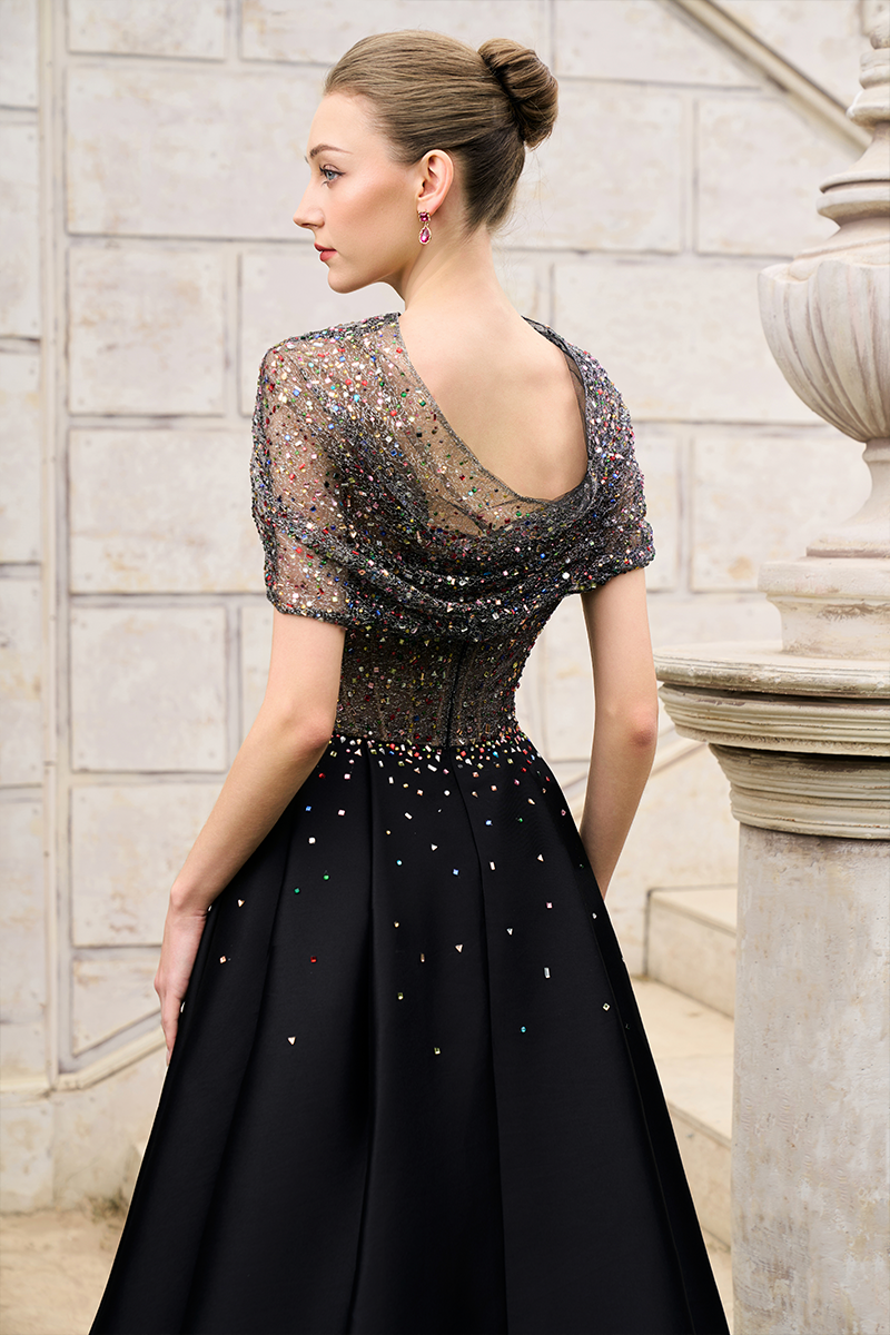 Elegant Tracy Studio crystal lace and bamboo taffeta gown with intricate lace details and flowing fabric, perfect for formal occasions.