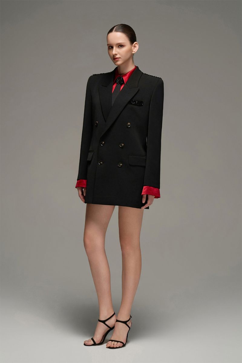 Black oversized double-breasted blazer from I.H.F Studio, featuring wide lapels and a relaxed fit, shown on a model.