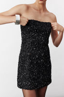 Black Casey Mini Sequin Dress by Nazlı Ceren, featuring shimmering sequins and a stylish mini length, perfect for evening wear.
