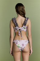 Nur Karaata St. Tropez Sway Bikini top with vibrant patterns and adjustable straps, perfect for beachwear and summer swimsuits.