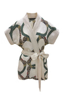 niLuu short sleeve wrap top in Celine style, featuring a fitted design with a V-neck and elegant wrap detail.