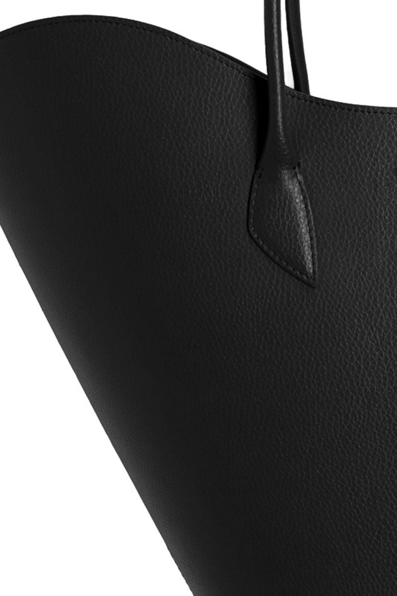 Black WILLOW shoulder handbag by ASK Scandinavia with a sleek design and adjustable strap, shown on a plain background.