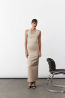 Nazlı Ceren Clarine long maxi dress in Cuban Sand with flowing fabric and elegant design, perfect for summer occasions.