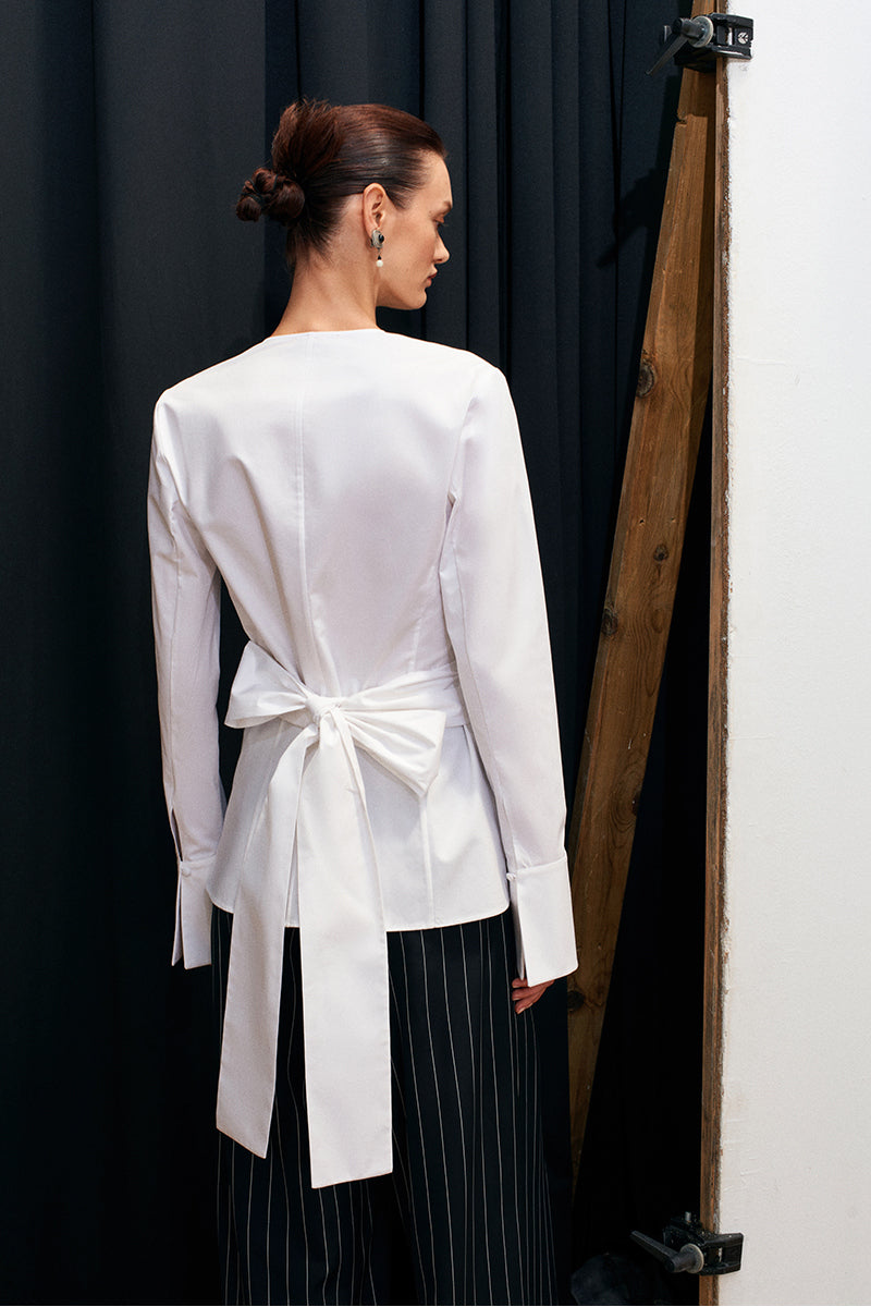 Acaria Studio Journey Shirt with long sleeves, lightweight fabric, and casual fit, shown in a neutral color.